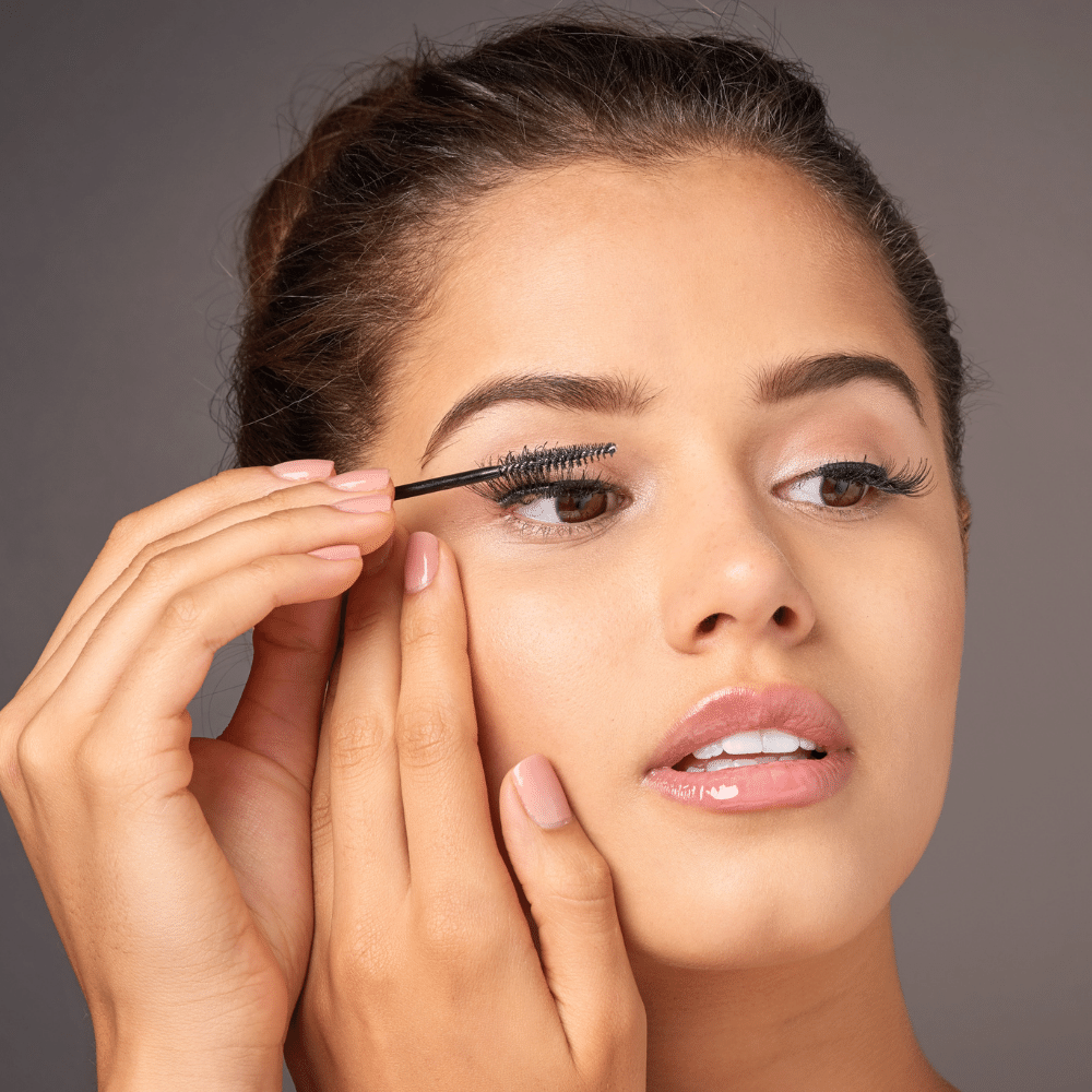 Girl using Best Eyelash Extension Glue